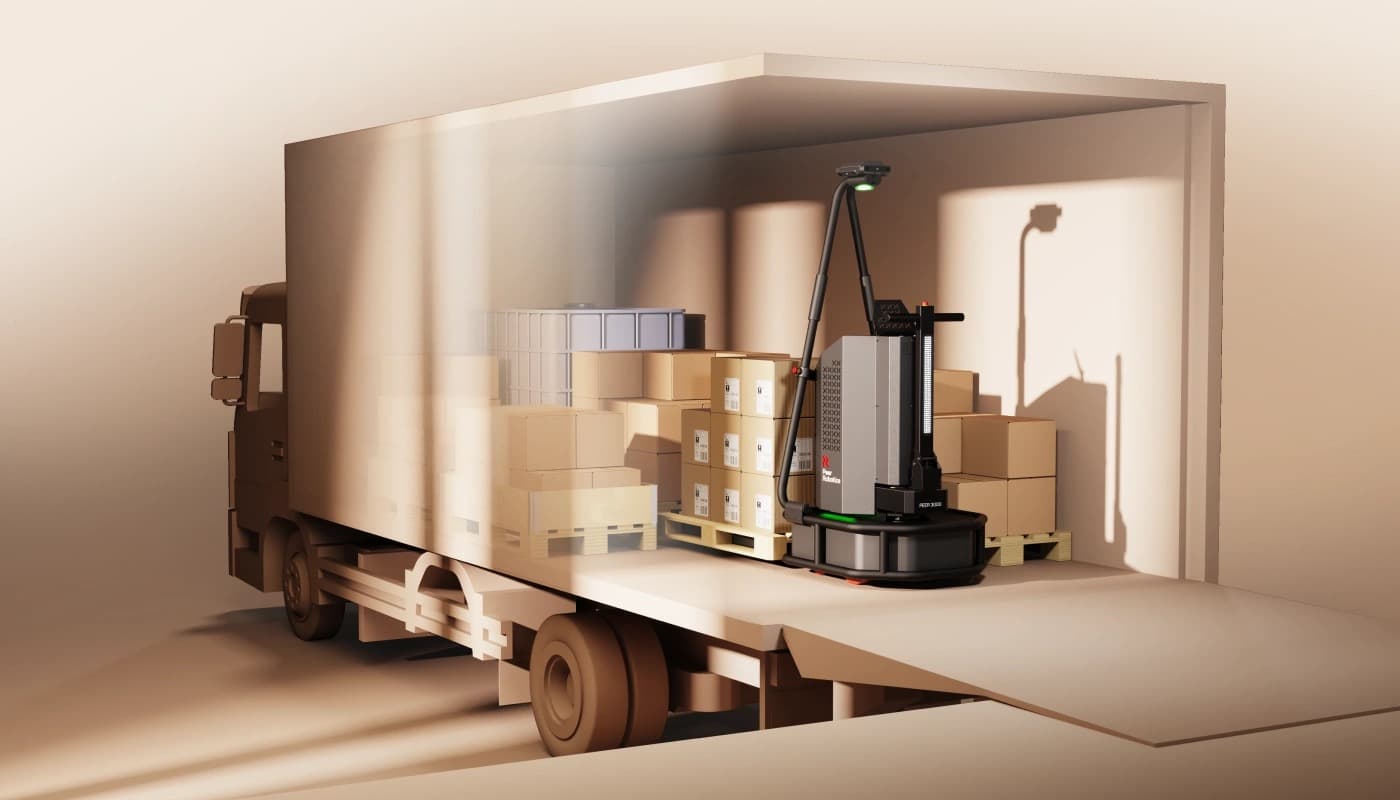A pallet-moving robot loading a trailer at the dock