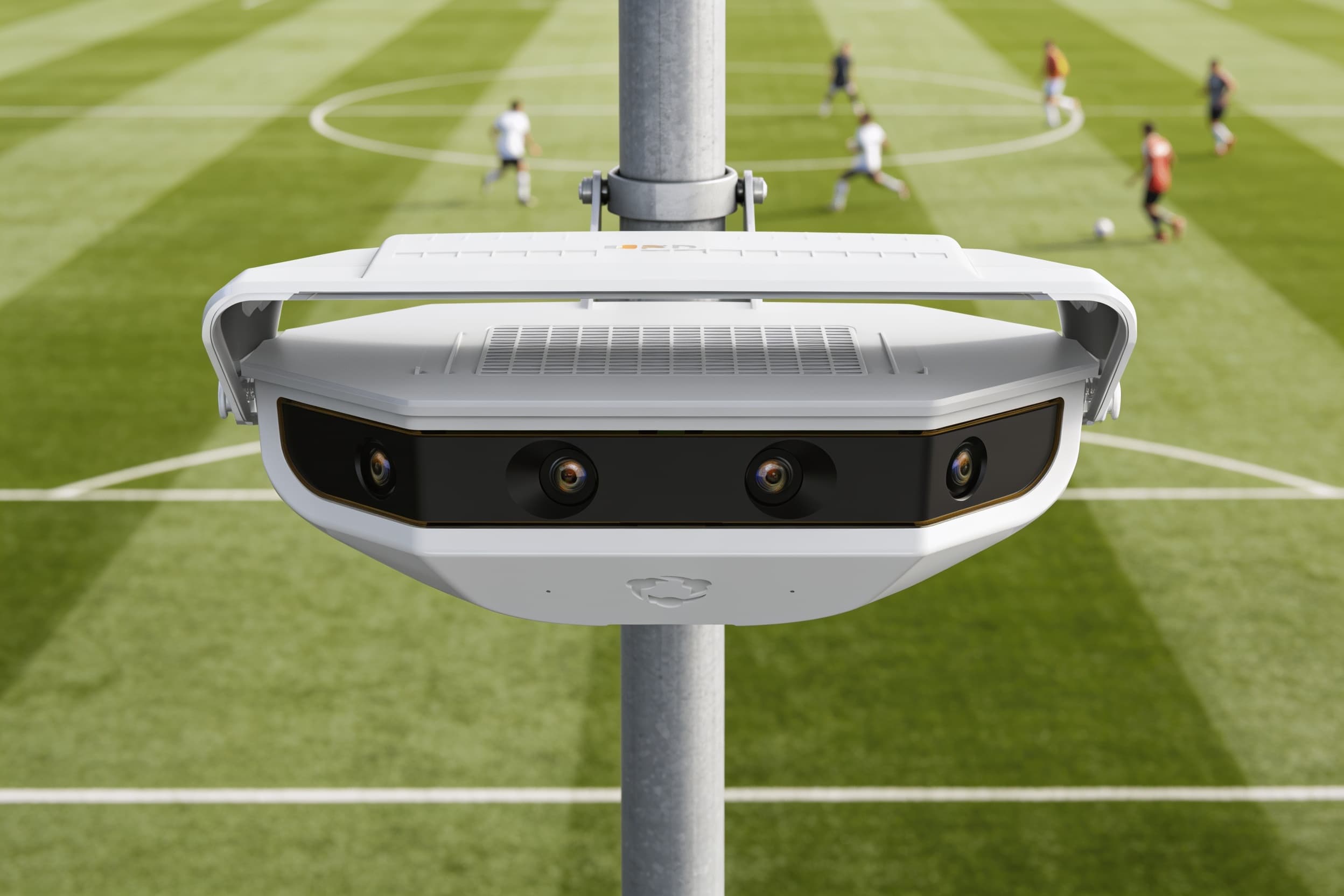 Camera on a pole above an outdoor field