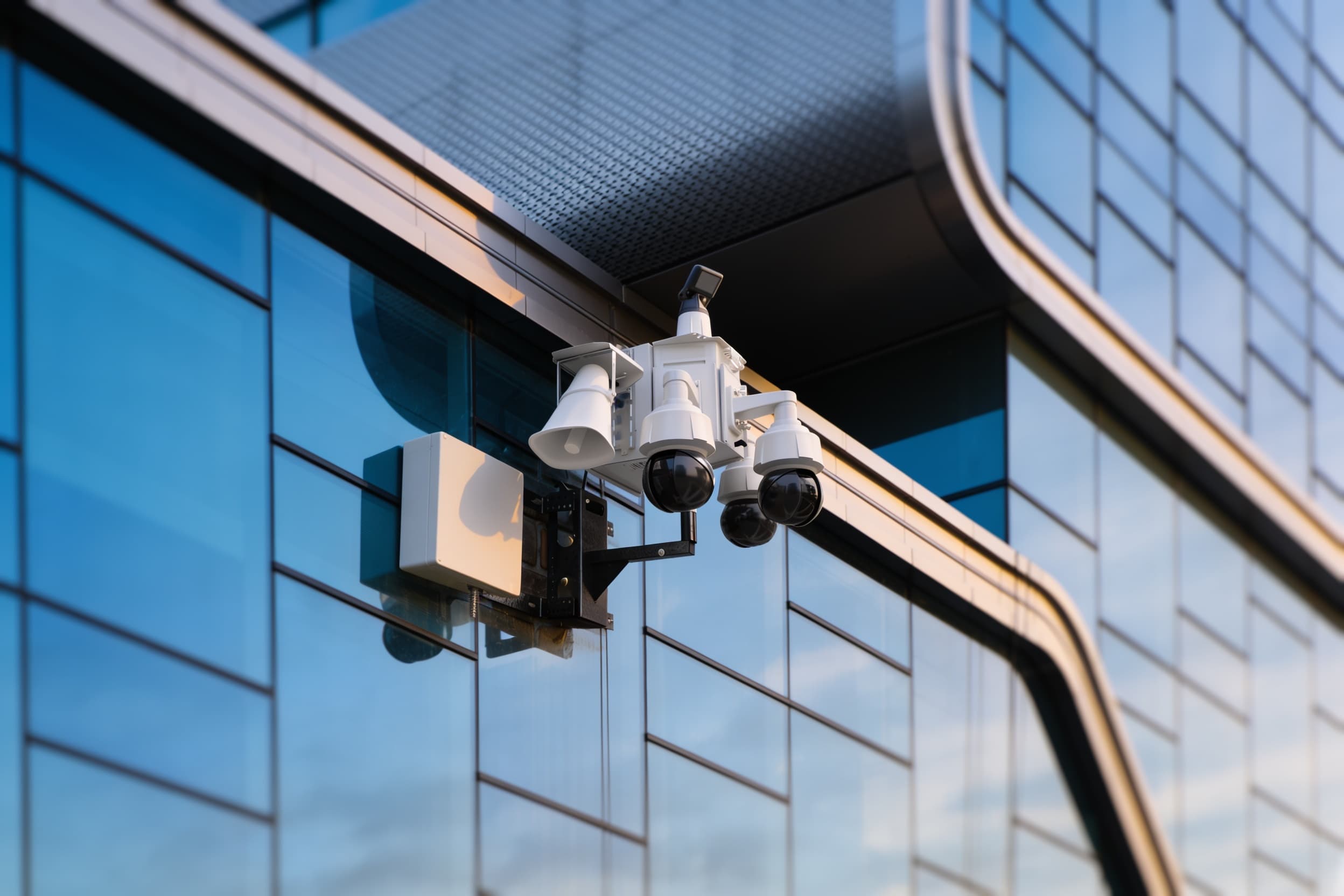 Camera head on an office building corner