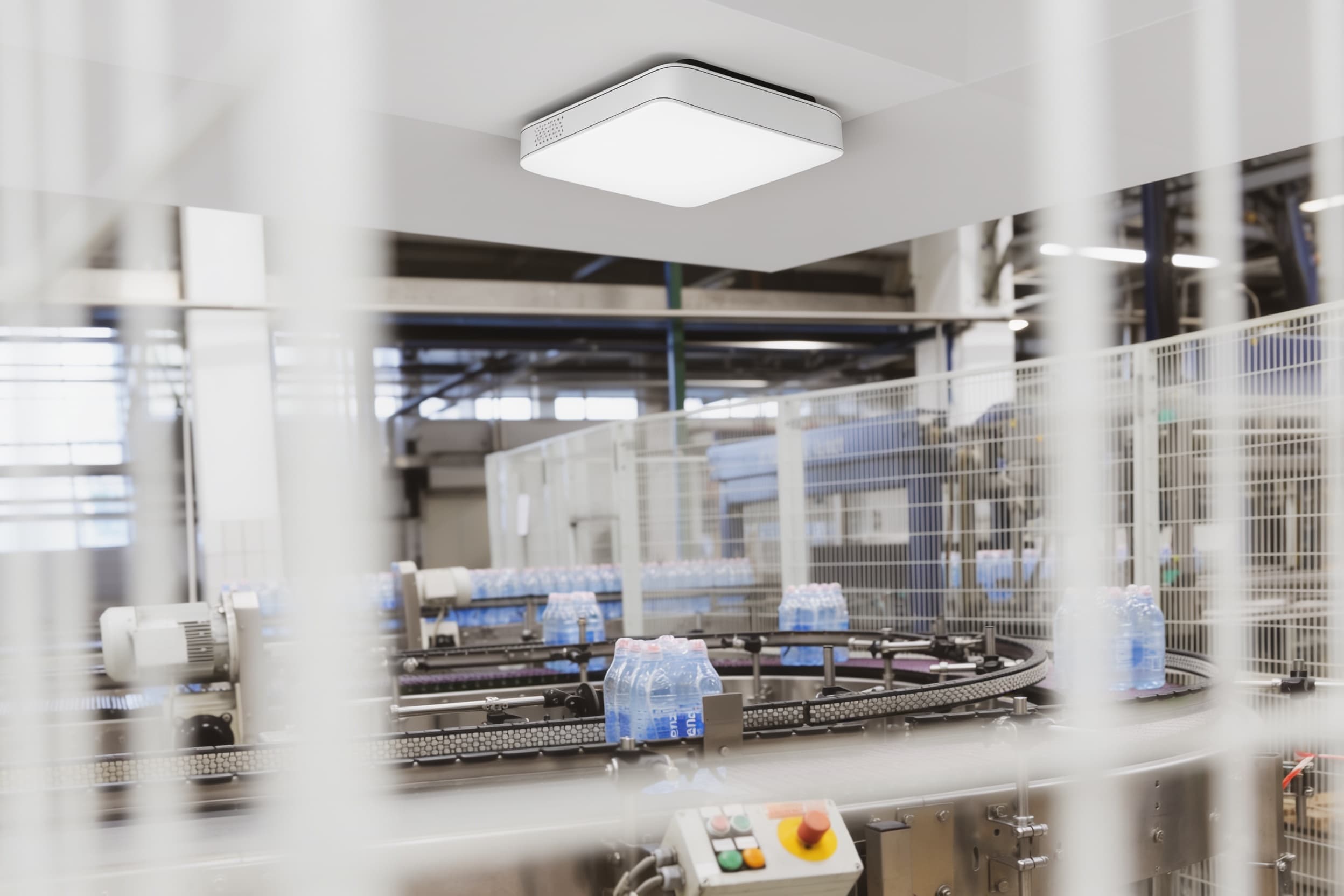 A security camera on the ceiling over the packing area